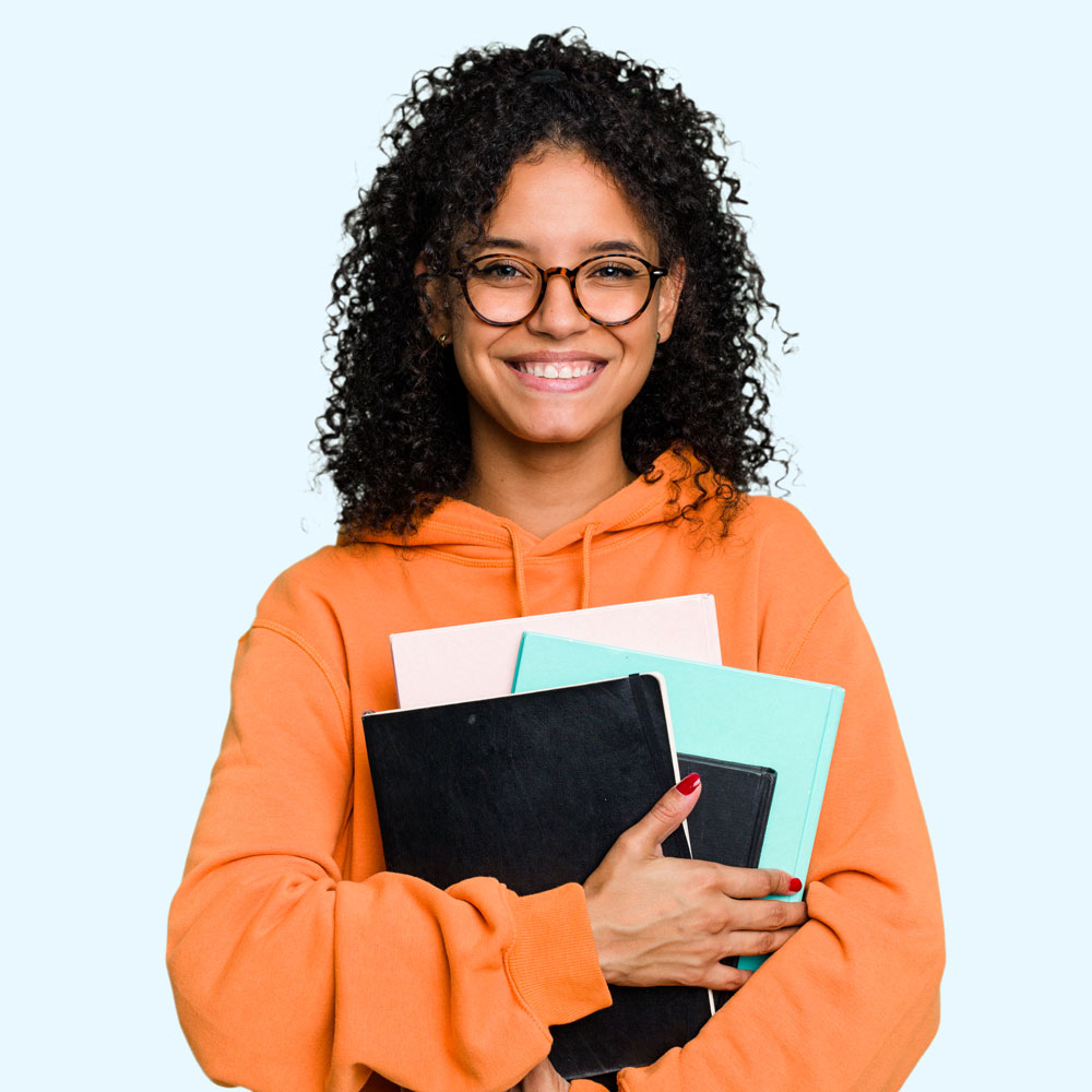 College-aged girl holding books